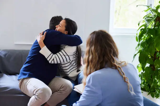 happy couple hugging each other